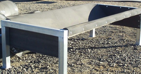 used conveyor belt used to create livestock feed trough